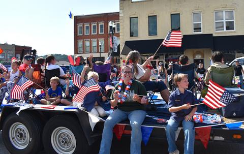 Bill Belian/Contributing Photographer Fourth of July Parade: Local Scouts were colorful, happy and patriotic during the route through downtown Murphy.