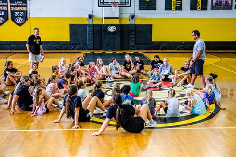 Photos by Sam Jokich/Staff Correspondent Top photo: Murphy High School held its annual girls basketball camp June 23-24 for aspiring Lady Bulldogs. Former Murphy girls basketball head coach Ray Gutierrez tells the campers what’s next for the day.