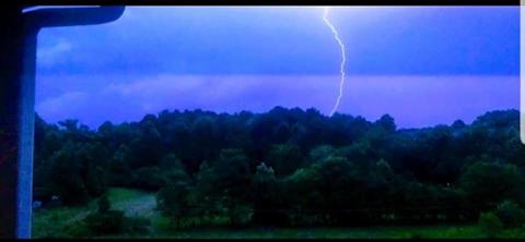 Adam Stewart/Contributing Photographer Thunder and lightning accompanied storms on July 6 in Cherokee and Clay counties, including this loud burst captured at the end of N.C. 69.