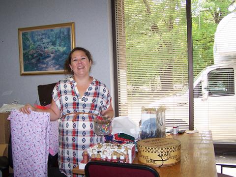 Julie Chautin/Contributing Photographer Murphy Public Library assistant Lashea Perez knows visitors will find what they need among the wide variety of items at the Crafts Supplies Sale from 9 a.m. to 4 p.m. Friday and 9 a.m. to 2 p.m. Saturday in the meeting room. Call 837-2417 for details.