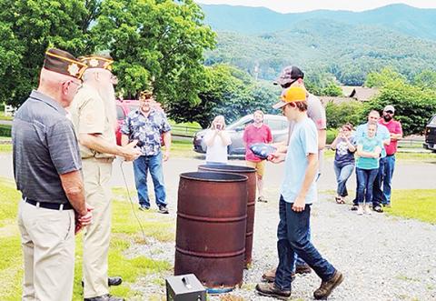 The Andrews middle and high school shooting teams assisted the Andrews VFW with a flag retirement ceremony on June 11.