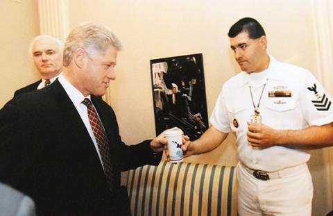 Gregg Harrell provides President Bill Clinton with a beverage. 