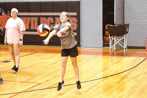 Berkley Ragon tries to keep the ball in the air during the Andrews Volleyball Camp on July 28. 