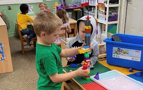 From left, James, Noah, Elijah (front), Kaidence and Colter (front) use materials to learn through discovery at the Head Start educational center in Andrews.