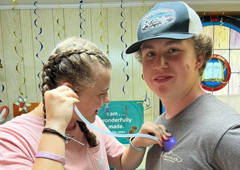 Teenagers in the science room are (from left) Maggie Allison and Colby Oxton. 