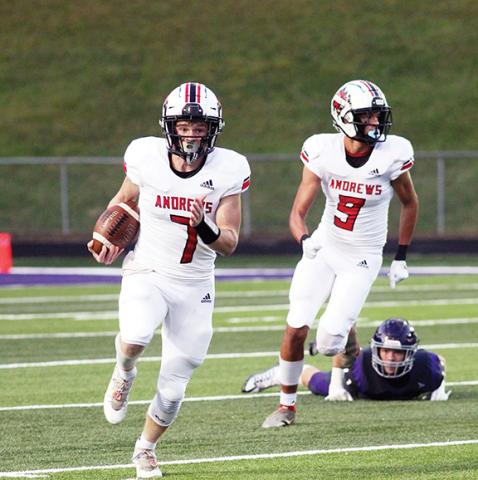 Cory Spiers/Mitchell News Journal Andrews’ Isaac Weaver (7) looks for open running room during the Wildcats’ 44-27 win over a tough Mitchell team on Friday night.