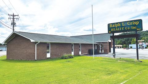Jared Putnam/editor@cherokeescout.com Andrews Town Hall is preparing to move into the former longtime business home of Ralph L. Crisp Realty Co. on Main Street.