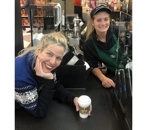 Jason Butler/Contributing Photographer Columnist Abigail Blythe Batton with charming Starbucks barista Ashlyn Weaver (right) at Ingles in Murphy.
