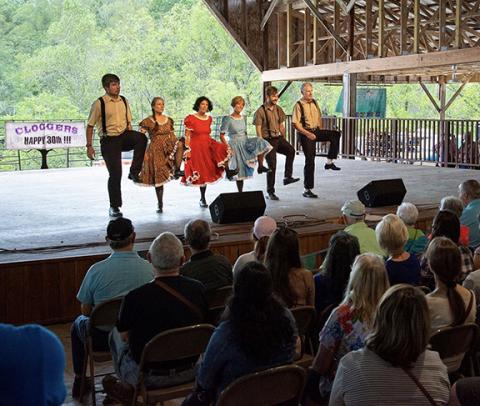 Abigail Blythe Batton/Staff Correspondent The John C. Campbell Folk School Cloggers entertain crowds at a previous Fall Festival.