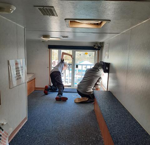 Photos by Anngee Quinones-Belian/Staff Correspondent  Kids entered the Ranger Volunteer Fire Department safety house to learn about fire and smoke, as well as what to do in those situations.