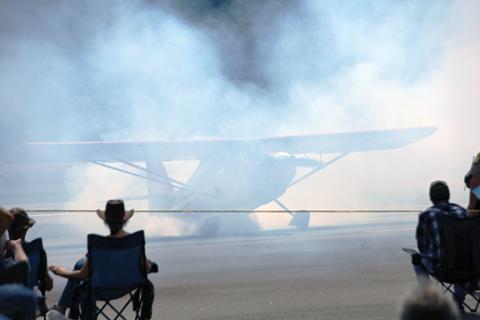Debbie Hooper/Contributing Photographer This plane was showing off its smoke during the annual Welcome Home – A Tribute to All Who Served event on Sept. 24.