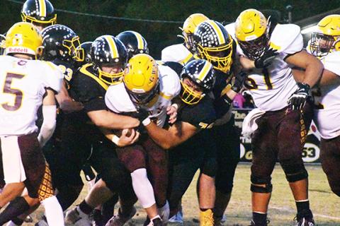 Justin Fitzgerald/sports@cherokeescout.com The Bulldogs’ defense gave Cherokee little room to run in their 49-14 win over the Braves on Thursday night.