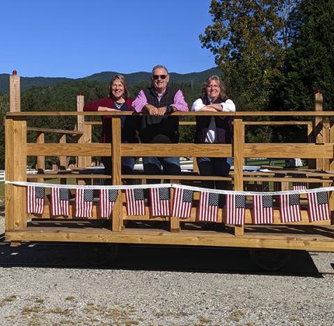 Abigail Blythe Batton/Staff Correspondent Judy and Jack Roberson ride along with Andrews Chamber of Commerce Executive Director Nola Cooper in anticipation of the grand opening of their Andrews Valley Rail Tours at 10 a.m. Saturday from the depot platform.