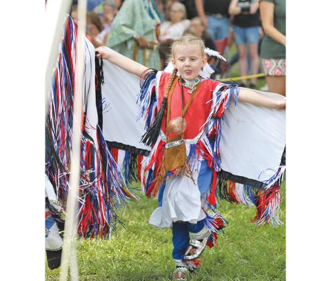 Colorfully adorned dancers perform at the Pow Wow in Waterloo, Ala., during the Trail of Tears Memorial Ride.
