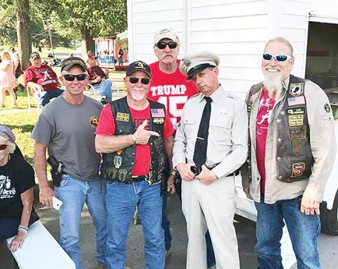 Courtesy of Dave “Scout” Nelson The Trail of Tears Commemorative Motorcycle Ride that began Sept. 16 in Murphy continued across the country before ending in Oklahoma. Bridgeport, Ala., riders took a break to pose with “Barney,” who came with a Mayberry patrol car and one bullet in his pocket.