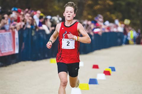 Justin Fitzgerald/sports@cherokeescout.com Tri-County Early College freshman Fern Crayton overcame a challenging fall to take fifth at last weekend’s 1A cross-country state championship.