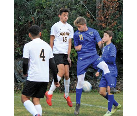 Ryan Hanchett/The Highlander Murphy’s Elijah Twiggs battles with a Highlands player for the ball during the Bulldogs’ 6-1 loss to the Highlanders in the first round of the state playoffs Nov. 1.