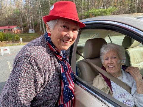 Photos by Rex Davis/ Contributing Photographer: Judy Elder and Frances Davis (voting by car) fulfill their patriotic duties at the Hanging Dog poll precinct on Nov. 8.