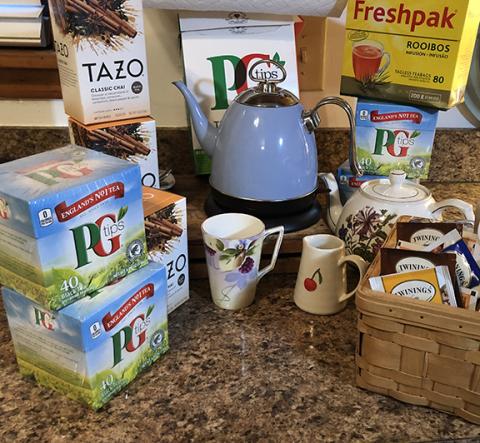 An assortment of Abigail Blythe Batton’s favorite tea things including her treasured twinkle blue tea kettle with the gooseneck spout.