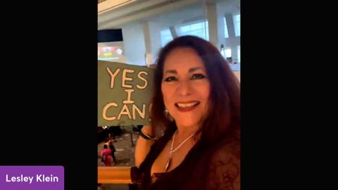 Lesley Klein holds up her inspirational sign at the Atlanta auditions for the Great American Speak Off show.