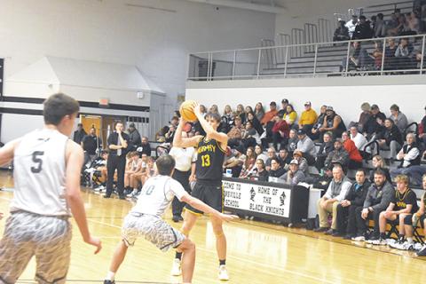 Justin Fitzgerald/sports@cherokeescout.com Murphy’s Zack Skogen looks for an open Bulldog during Murphy’s 48-33 loss at Robbinsville on Friday, Skogen led Murphy in scoring in losses against Robbinsville and Union County.