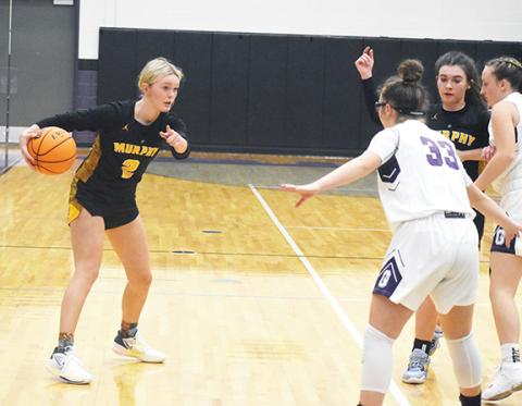 Justin Fitzgerald/sports@cherokeescout.com Murphy’s Lochlan Rogers gets the offense in motion during the Lady Bulldogs’ 54-51 loss at Gilmer on Nov. 29.