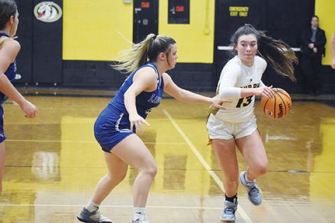 Justin Fitzgerald/sports@cherokeescout.com Murphy’s Addie Johnson looks for room to dribble during the Lady Bulldogs’ 59-54 loss to Hiwassee Dam on Dec. 8. Johnson scored a game-high 17 points during Murphy’s 61-54 win at Swain County on Dec. 20. It was the Lady Bulldogs’ first win of this basketball season.