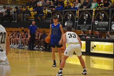 Justin Fitzgerald/sports@cherokeescout.com Hiwassee Dam’s Jonah Hamby looks for an open Eagle during his team’s 72-53 loss to Hayesville on Dec. 19.