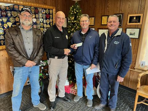 Cherokee Masonic Lodge 146 in Murphy recently donated $300 to Cherokee County’s Shop with a Cop program to help low-income children have a better Christmas. From left are Roy Dickey, Murphy Police Chief Tim Lominac, Ron Ledford and Reggie Pendley.