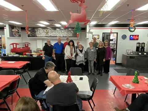 David Brown/dbrown@cherokeescout.com Team Industries in Andrews held a special luncheon Thursday for its 170-plus employees, who raised $2,800 over the last year for local charities. Plant manager Greg Boehm (from left) said the company matched that with another $1,000 for $3,800 total in donations. That money went to Warrior Veterans Outreach, represented by Gary Wilson; Tots for Tots, represented by John Evans; Reach of Cherokee County Inc., represented by Michele Steinberg and Cecilia Faulkner; the Chero