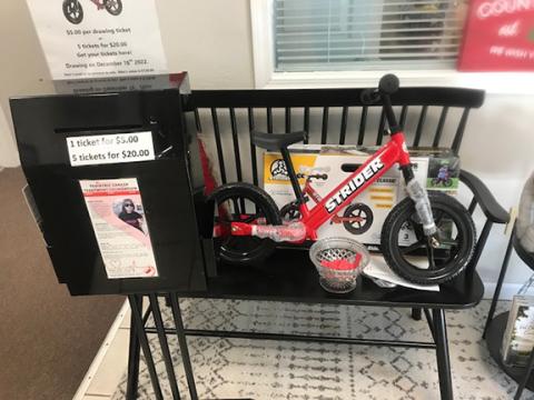 The Pediatric Cancer Treatment Foundation held a drawing for a Strider kid’s bike drawing on Dec. 16 at Farley Insurance Services in Murphy. The winning ticket belonged to Greg Knust of Murphy. The foundation thanks all those who participated, as well the Cherokee Scout for support, and especially the staff at Farley Insurance for hosting this year’s drawing.