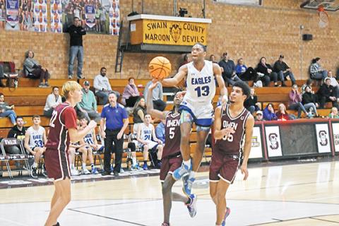 Justin Fitzgerald/sports@cherokeescout.com Hiwassee Dam’s Leo Hickson rises for a layup during the Eagles’ 80-76 win over Owen on Friday.