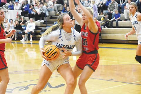 Justin Fitzgerald/sports@cherokeescout.com Hiwassee Dam’s Olivia McNabb battles with Copper Basin’s Sapporiah Ross during the Lady Eagles’ 68-59 win over the Lady Cougars on Jan. 20.