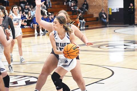 Justin Fitzgerald/sports@cherokeescout.com Hiwassee Dam’s Brooklyn Hyde looks for an open teammate during the Lady Eagles’ 64-60 win at Swain County on Friday.