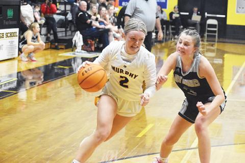 Justin Fitzgerald/sports@cherokeescout.com Murphy’s Lochlan Rogers tries to drive to the basket during the Lady Bulldogs’ 64-59 loss to Robbinsville on Thursday night.