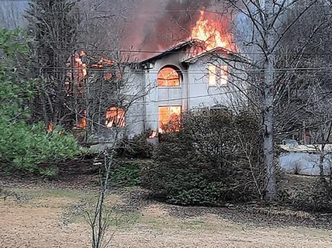 Anngee Quinones-Belian/Staff Correspondent Fire destroyed a two-story residential home in Bellview on Jan. 12, despite the efforts of firefighters to control it. Read the article and see more photos in the Jan. 18 edition.