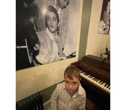 A life-size picture hangs on the wall where the “Million Dollar Quartet” had a jam session at the Sun Recording Studio in Memphis, Tenn., in the 1950s. Lochlainn Ledford sits on the same piano stool where Elvis Presley played while working out the music with Jerry Lee Lewis, Carl Perkins and Johnny Cash. 
