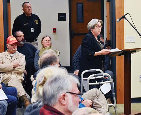 Randy Foster/editor@cherokeescout.com  Becky Wright speaks at the podium during the Feb. 20 county commission meeting.
