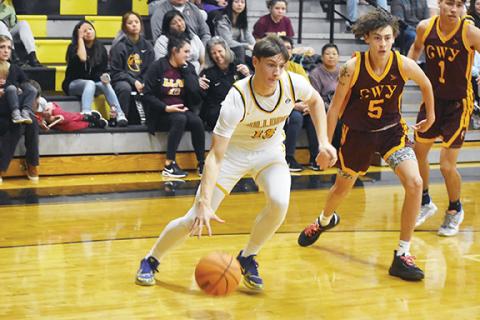 Justin Fitzgerald/sports@cherokeescout.com Murphy’s Zach Skogen cuts to the basket during the Bulldogs’ 82-77 win over Cherokee on Feb. 7. Skogen scored a team-high 24 points in the win.