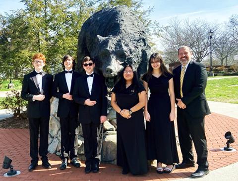 Patton High School Band Director Chad Higdon, formerly of Andrews, is shown with some of his students from the Patton High School Panther Regiment on the campus of Lenoir-Rhyne University in Hickory.