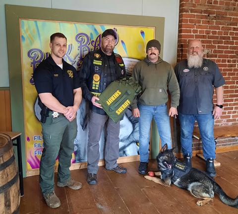 Anngee Quinones-Belian/Staff Correspondent  From left are Cherokee County sheriff’s Detective C. Stiles; Chris “Sig” Poston with the Nam Knights Motorcycle Club; sheriff’s K-9 handler and Deputy Dakota Howard; Patrick Keenan, owner of Buck Bald Brewing; and K-9 Officer Ellie.