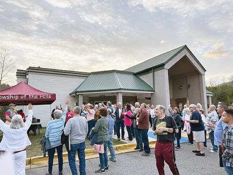 Ivelisse Miranda-Wilson/Contributing Photographer  Folks of faith gathered for prayer in the parking lot of Blairsville Cinema last week prior to viewing the movie Jesus Revolution.