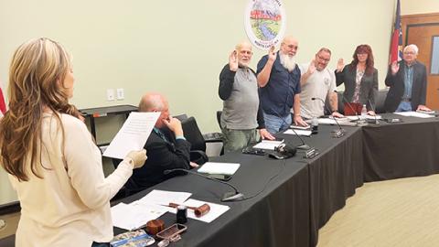 Randy Foster/editor@cherokeescout.com Making plans: The Cherokee County Planning Board is sworn in during its inaugural meeting on March 21. The oath is administered by assistant county manager Maria Hass (from left) – with legal advice provided by county attorney Darryl Brown – with board members Dan Eichenbaum, Ben Adams, Randy Phillips, Jan Griggs and Cal Stiles – all of whom are also county commissioners – taking the oath.