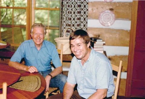 Above: Former President Jimmy Carter visits with Curtis Brown of Murphy at Carter’s cabin in Cherry Log, Ga. Below: Brown and Carter at the Emerson plant.