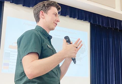 Randy Foster/editor@cherokeescout.com  State deer biologist Moriah Boggess describes the deer population in western North Carolina during a public forum on March 14 at Tri-County Community College.