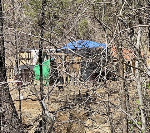 Randy Foster/editor@cherokeescout.com  This improvised campsite off Rocky Creek Road near U.S. 19/74, owned by Andrews Alderman Steve Jordan and rented to an unidentified couple, led to a confrontation.