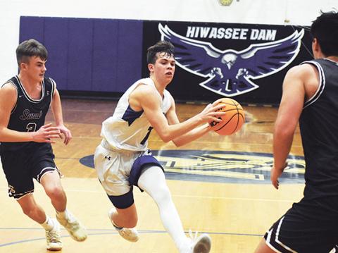 Justin Fitzgerald/sports@cherokeescout.com Hiwassee Dam’s Preston Hyde knifes through the lane during the Eagles’ 63-58 loss to Swain County on Dec. 2. The two teams met again in the first round of the state playoffs on Feb. 21, with the Maroon Devils coming out on top, 71-62.