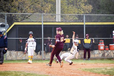Justin Fitzgerald/sports@cherokeescout.com  Murphy’s Mason Cook slides into home during the Bulldogs’ 19-4 win over Cherokee on March 21.