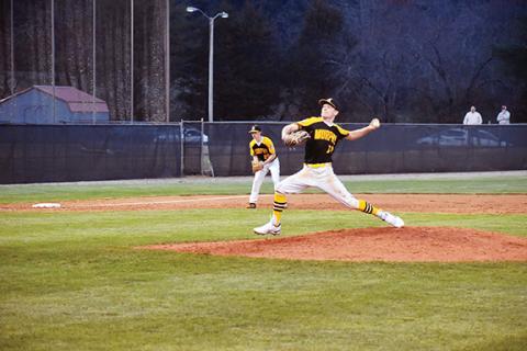 Justin Fitzgerald/sports@cherokeescout.com Murphy’s Cole Laney strides toward the plate during the Bulldogs’ 14-4 loss to Franklin on March 1.