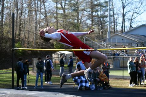 Photos by Justin Fitzgerald/ sports@cherokeescout.com Andrews freshman  Logan Shuler  (top photo),  along with senior  Rylie McDonald  (right photo), qualified for regionals in the  high jump and shot  put, respectively,  during the meet in Hayesville on  March 15.
